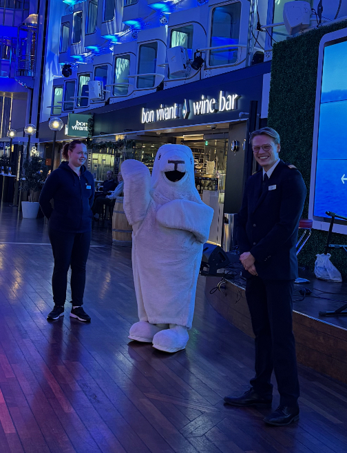 Fluffy White Seal Person on Ferry